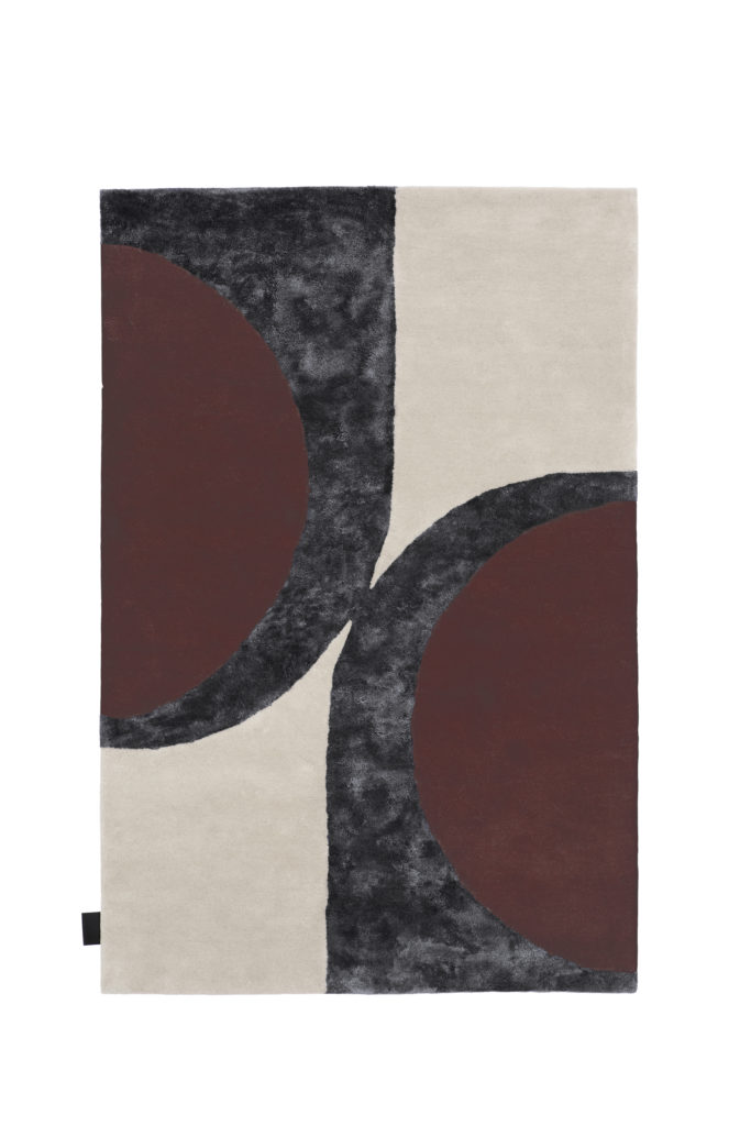 Matta i färgerna vitt, grått och rött